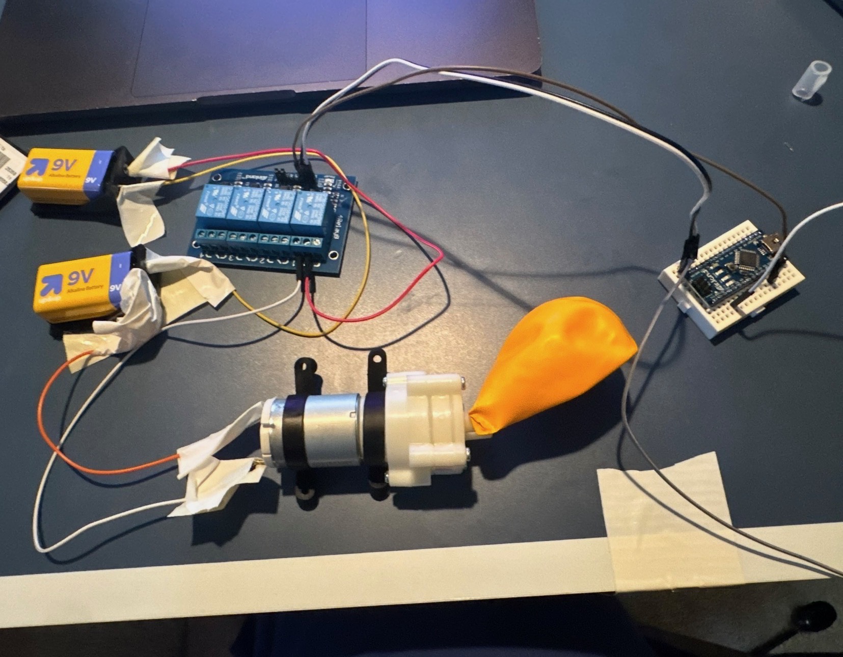 Early O-Seal prototype components laid out for assembly