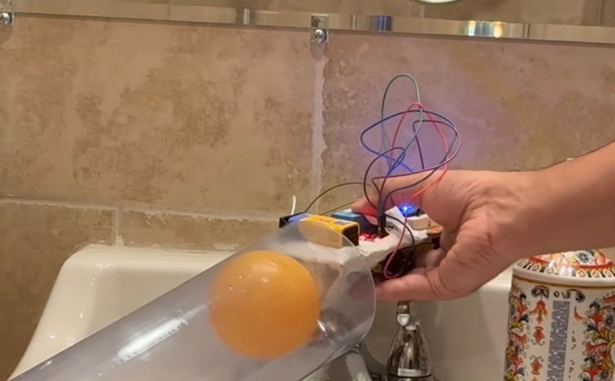 Early O-Seal prototype balloon inflated inside transparent PVC pipe